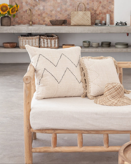 Imperfect Nya Hand Stitched Cotton Throw Pillow handmade by Village Thrive using natural materials.