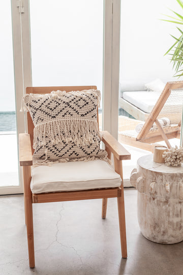 Bohemian Tasseled Macrame Throw Pillow handmade by Village Thrive using natural materials.