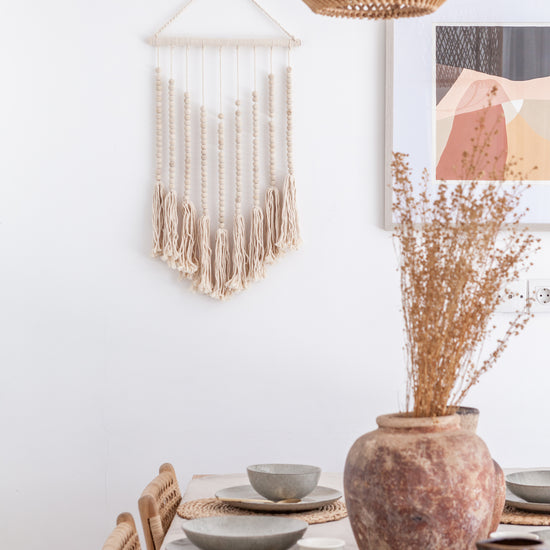 Tanah Beaded Wall Hanging handmade by Village Thrive using natural materials.