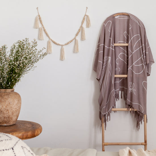 Imperfect Desert Kimono handmade by Village Thrive using natural materials.