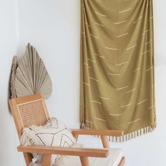 Imperfect Lines Tapestry handmade by Village Thrive using natural materials.