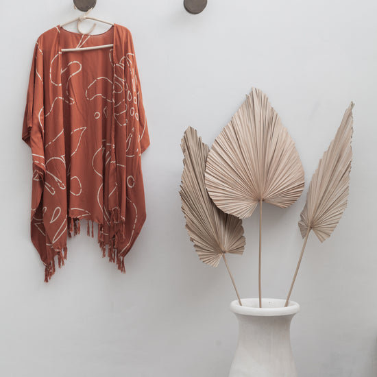 Imperfect Monstera Kimono handmade by Village Thrive using natural materials.