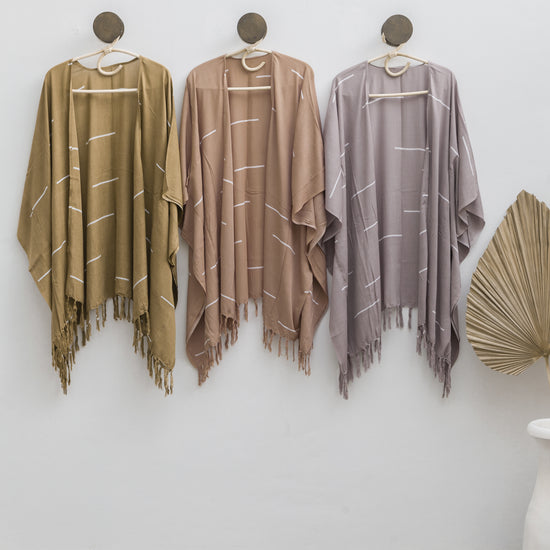 Imperfect Lines Kimono handmade by Village Thrive using natural materials.