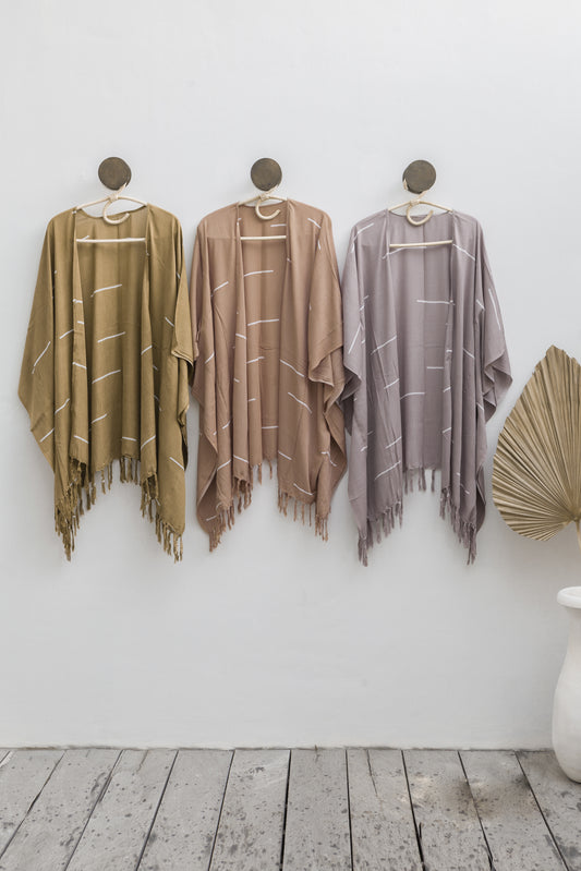 Imperfect Lines Kimono handmade by Village Thrive using natural materials.