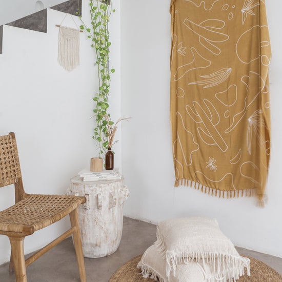 Imperfect Desert Tapestry handmade by Village Thrive using natural materials.