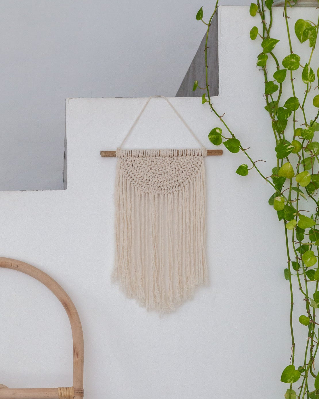 Iris Macrame Wall Hanging handmade by Village Thrive using natural materials.