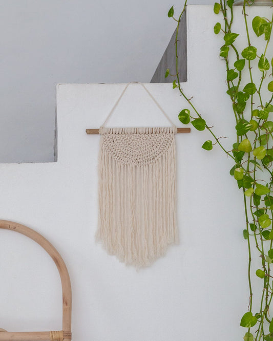 Iris Macrame Wall Hanging handmade by Village Thrive using natural materials.