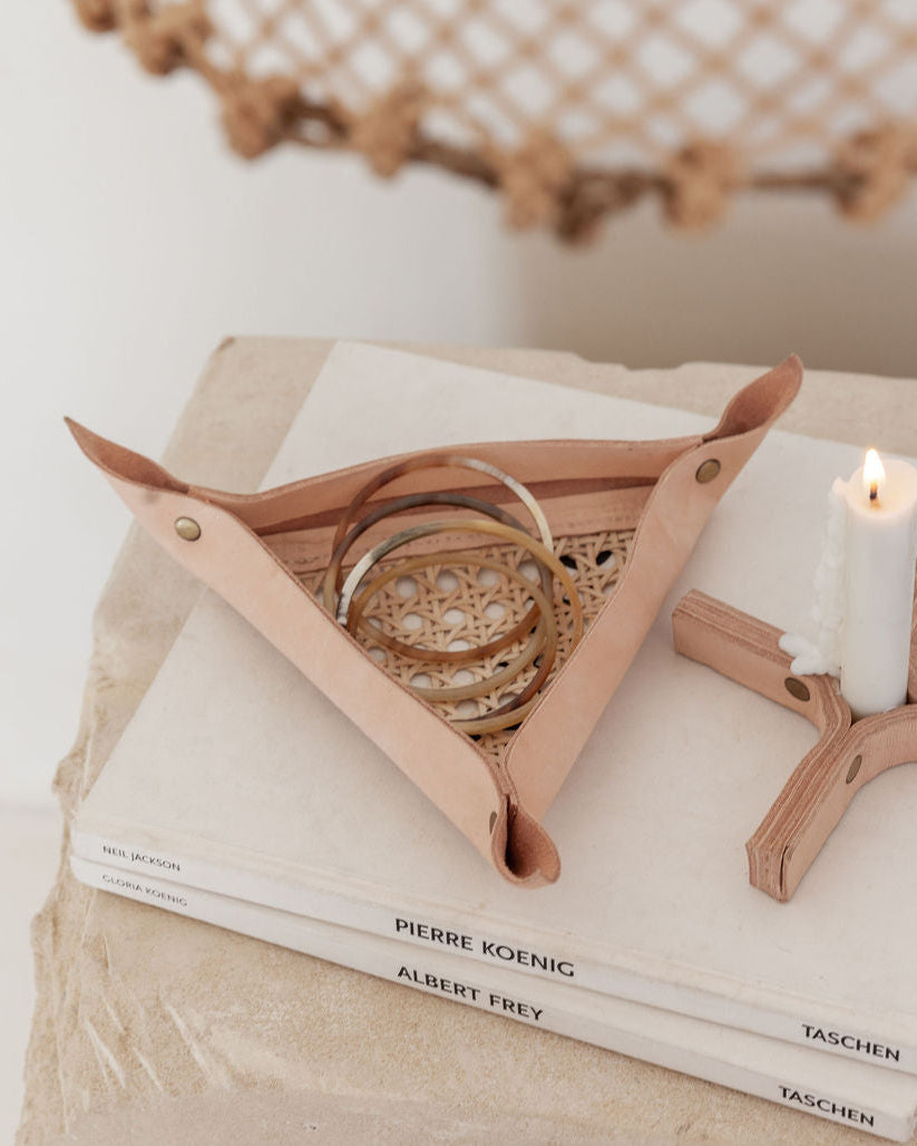 Leather and Cane Webbing Catch-all handmade by Village Thrive using natural materials.