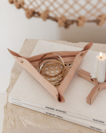 Leather and Cane Webbing Catch-all handmade by Village Thrive using natural materials.