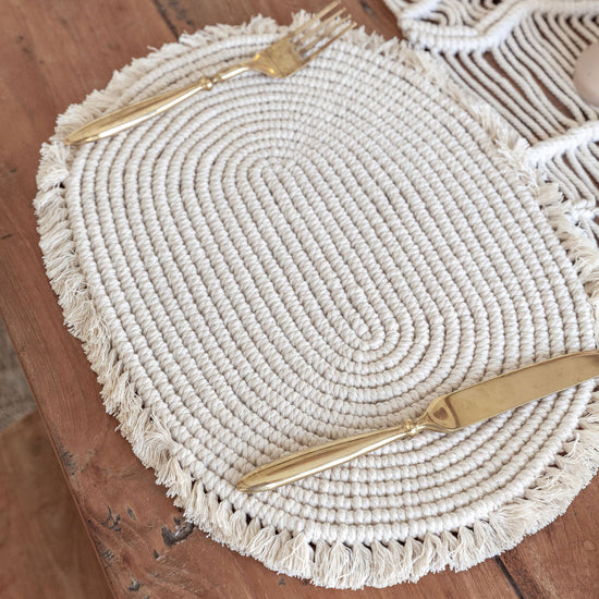 Organic Cotton Macrame Placemat handmade by Village Thrive using natural materials.