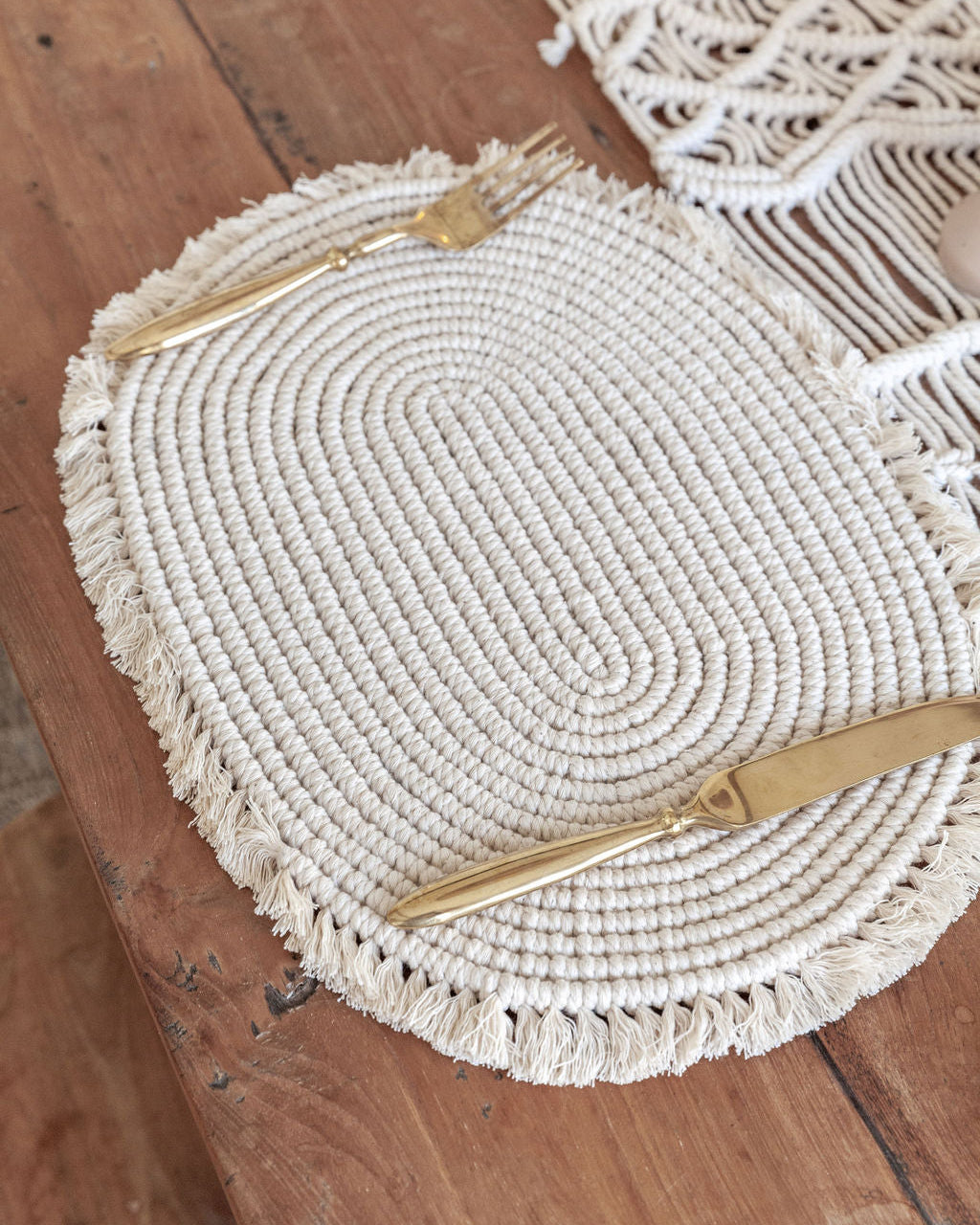 Organic Cotton Macrame Placemat handmade by Village Thrive using natural materials.
