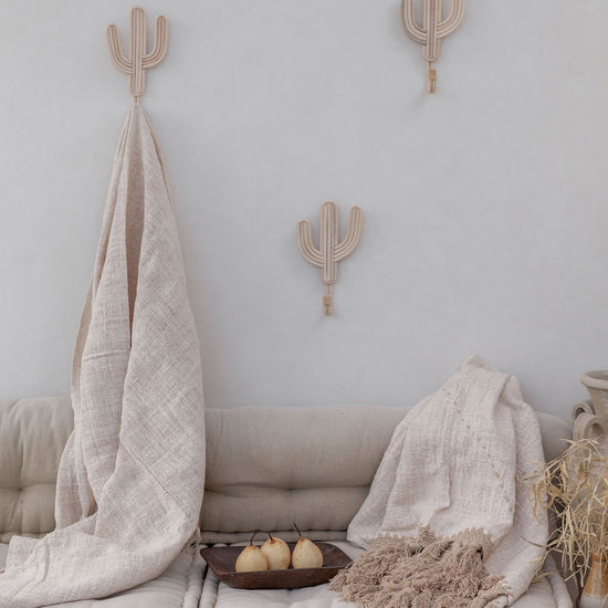 Imperfect Cactus Wall Hook handmade by Village Thrive using natural materials.