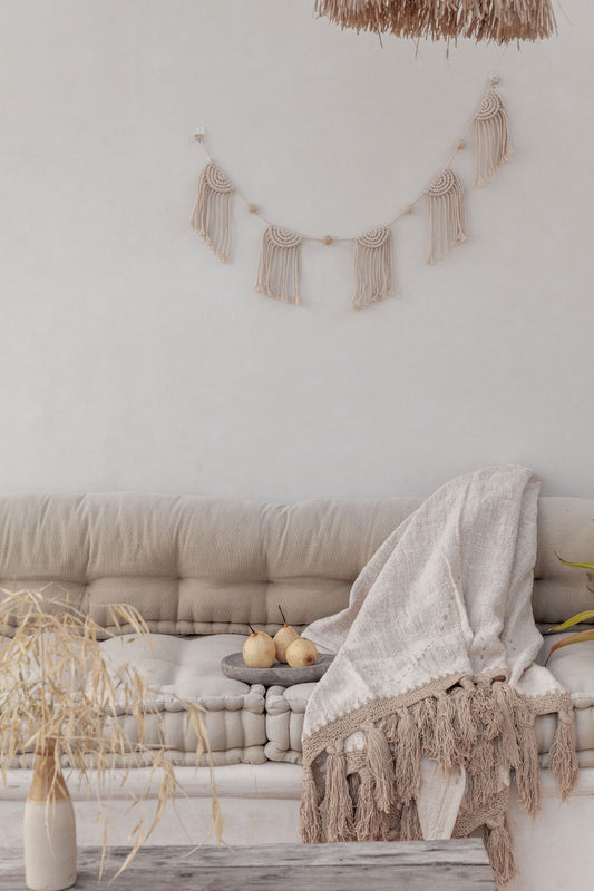 Iris Macrame Garland handmade by Village Thrive using natural materials.