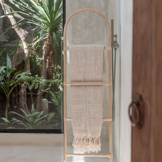 Arch Rattan Ladder handmade by Village Thrive using natural materials.