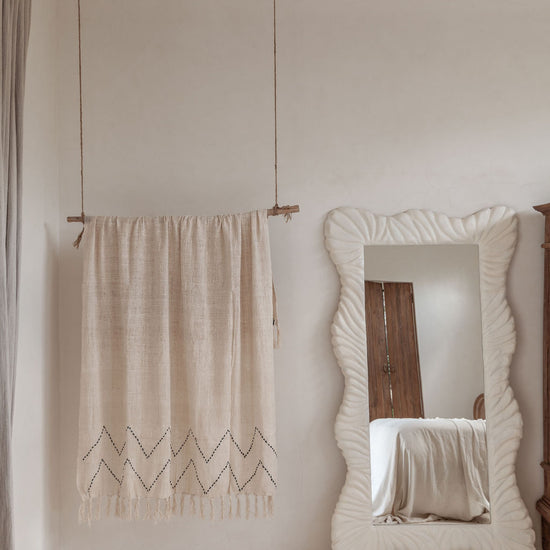 Hand Loomed Cotton Blanket in Black Motif handmade by Village Thrive using natural materials.