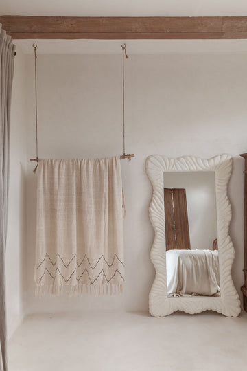 Hand Loomed Cotton Blanket in Black Motif handmade by Village Thrive using natural materials.