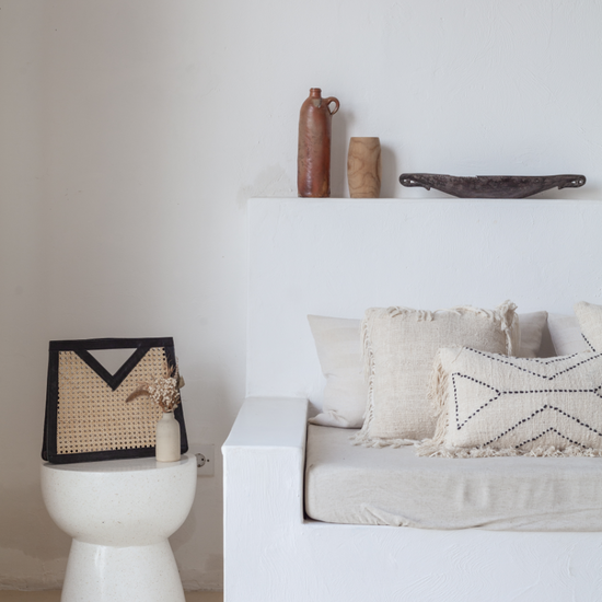 Raja Leather and Cane Handbag handmade by Village Thrive using natural materials.