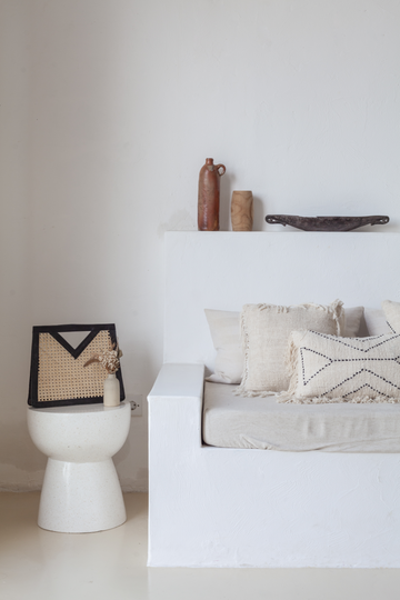 Raja Leather and Cane Handbag handmade by Village Thrive using natural materials.