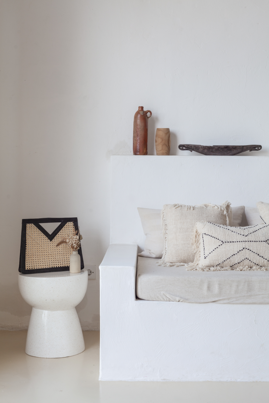 Imperfect Raja Leather and Cane Handbag handmade by Village Thrive using natural materials.