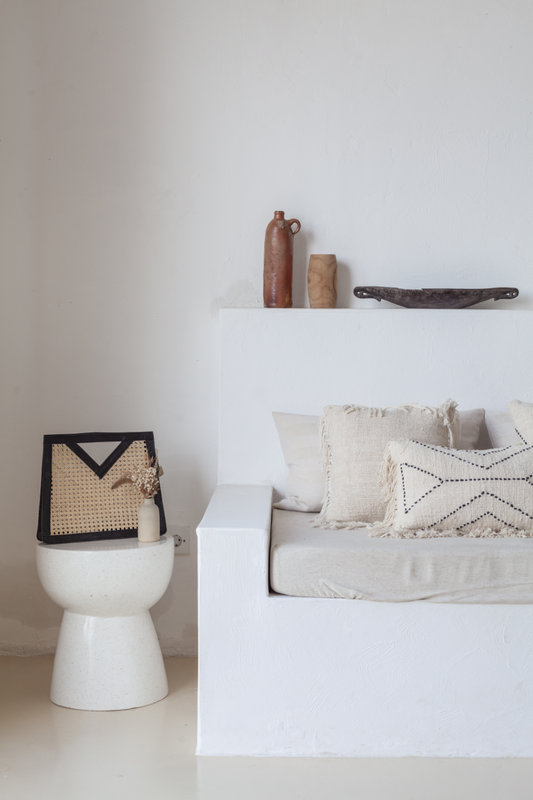 Imperfect Raja Leather and Cane Handbag handmade by Village Thrive using natural materials.