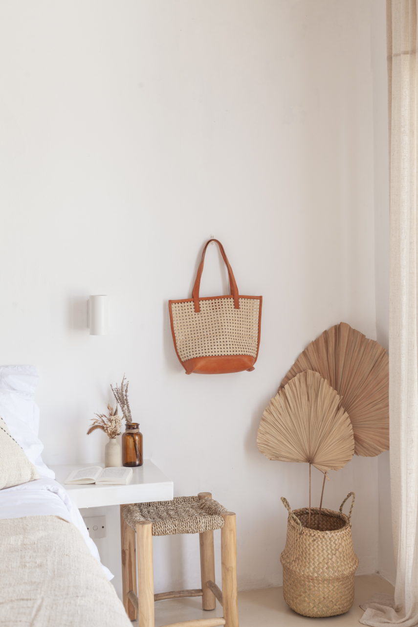 Imperfect Raja Leather and Cane Tote handmade by Village Thrive using natural materials.