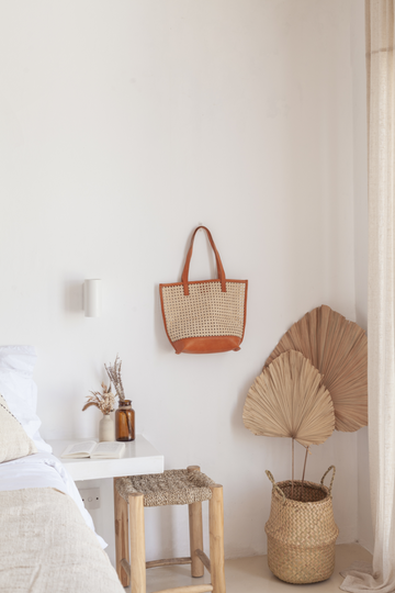 Imperfect Raja Leather and Cane Tote handmade by Village Thrive using natural materials.