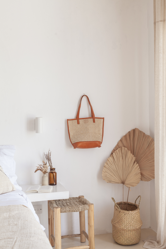 Imperfect Raja Leather and Cane Tote handmade by Village Thrive using natural materials.
