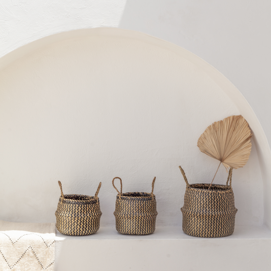 Tropika Home Basket handmade by Village Thrive using natural materials.