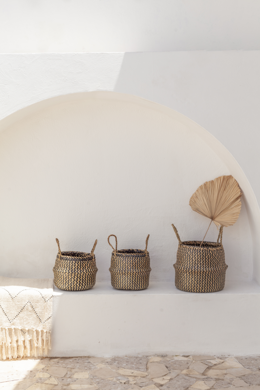 Tropika Home Basket handmade by Village Thrive using natural materials.