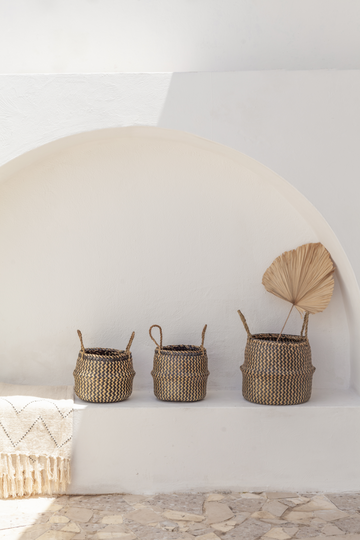Tropika Home Basket handmade by Village Thrive using natural materials.