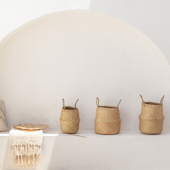 Imperfect Tropika Home Baskets handmade by Village Thrive using natural materials.