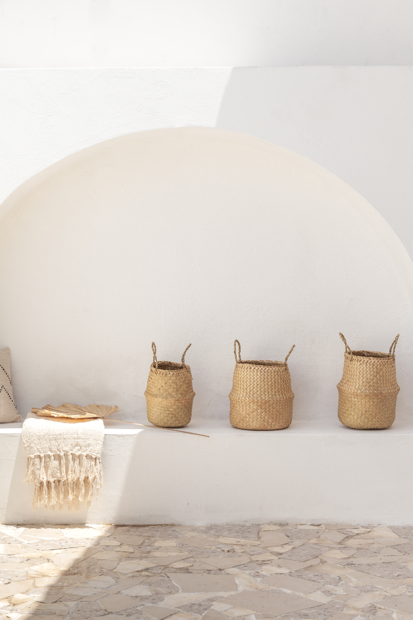 Imperfect Tropika Home Baskets handmade by Village Thrive using natural materials.