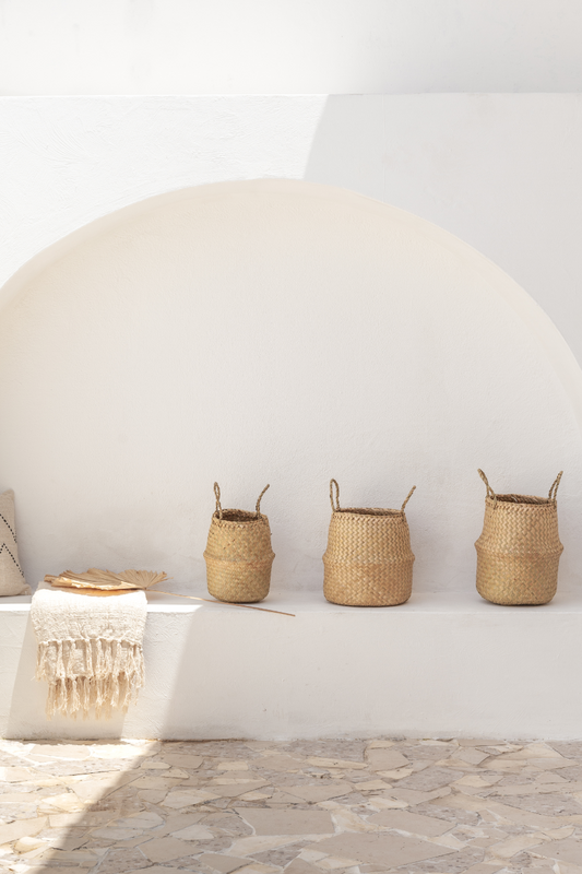 Imperfect Tropika Home Baskets handmade by Village Thrive using natural materials.