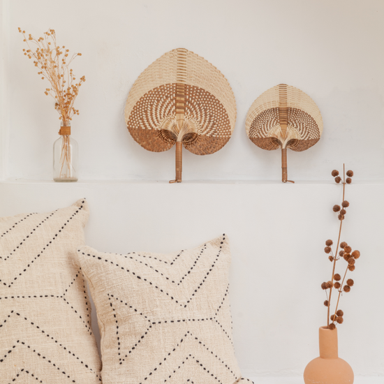 Ombre Woven Paradisio Fan handmade by Village Thrive using natural materials.