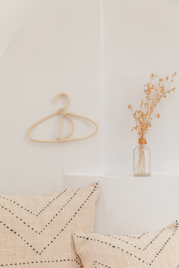 Moon Rattan Hanger handmade by Village Thrive using natural materials.
