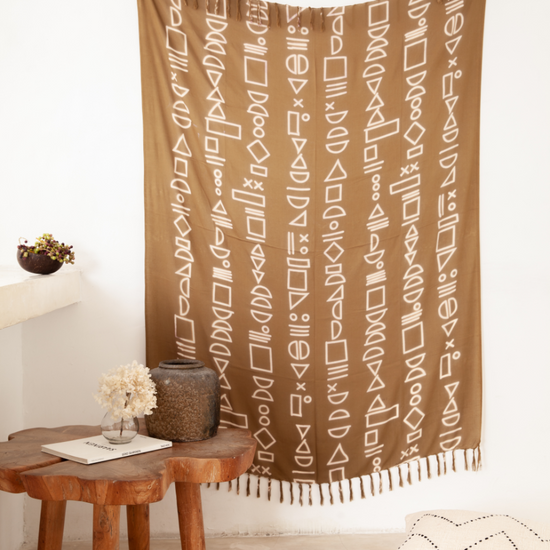 Imperfect Shapes Tapestry handmade by Village Thrive using natural materials.