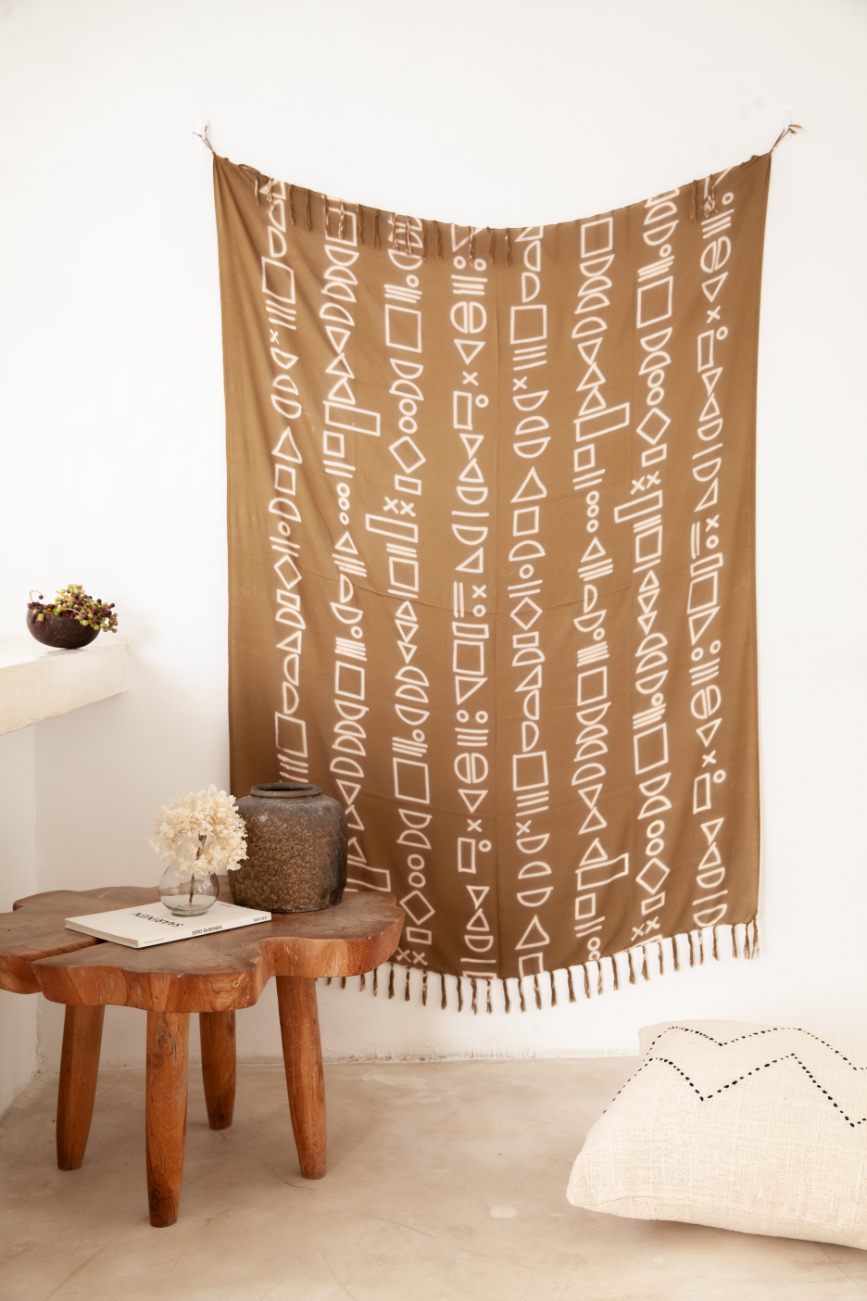 Imperfect Shapes Tapestry handmade by Village Thrive using natural materials.