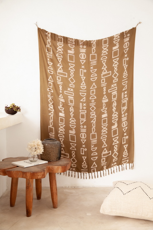 Imperfect Shapes Tapestry handmade by Village Thrive using natural materials.