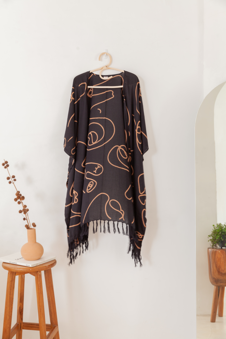 Faces Kimono handmade by Village Thrive using natural materials.