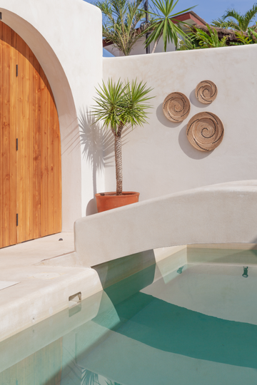 Rama Natural Wall Baskets handmade by Village Thrive using natural materials.