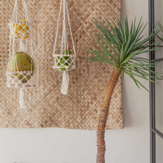 Macrame Hanging Basket handmade by Village Thrive using natural materials.