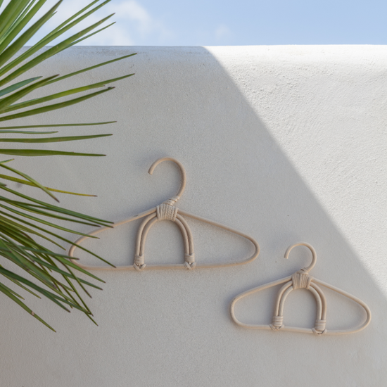Rainbow Rattan Hanger handmade by Village Thrive using natural materials.