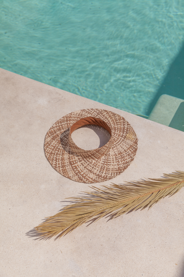 Ombre Holiday Papale Sun Hat handmade by Village Thrive using natural materials.