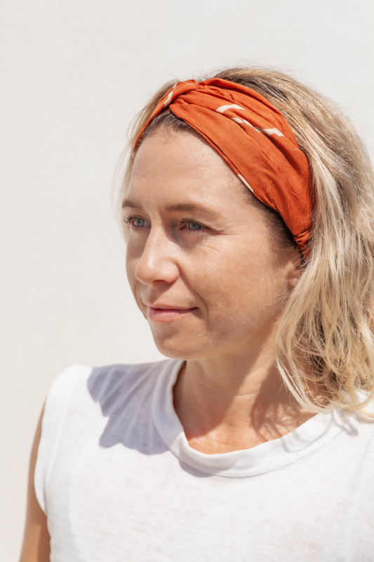 Kepala Headband handmade by Village Thrive using natural materials.