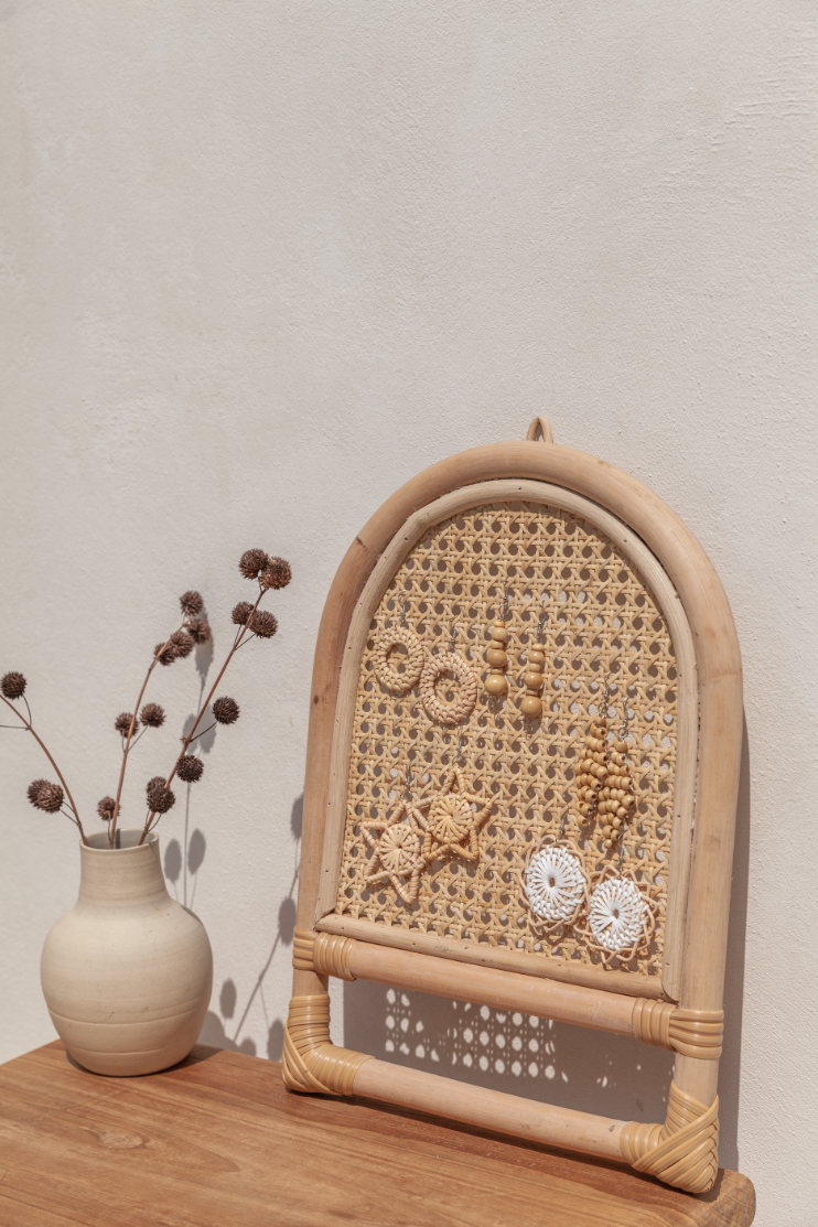 Imperfect Arch Rattan Jewelry Hanger handmade by Village Thrive using natural materials.