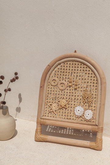 Arch Rattan Jewelry Hanger handmade by Village Thrive using natural materials.