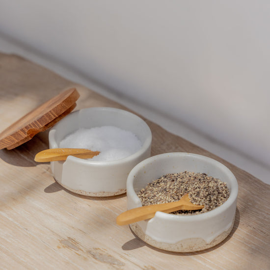 Wabi Ceramic Salt & Pepper Holder handmade by Village Thrive using natural materials.