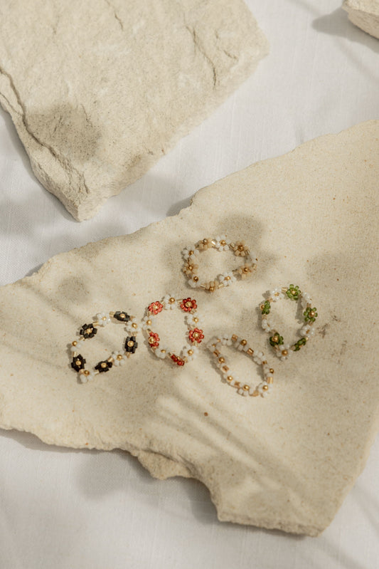 Flora Beaded Ring handmade by Village Thrive using natural materials.