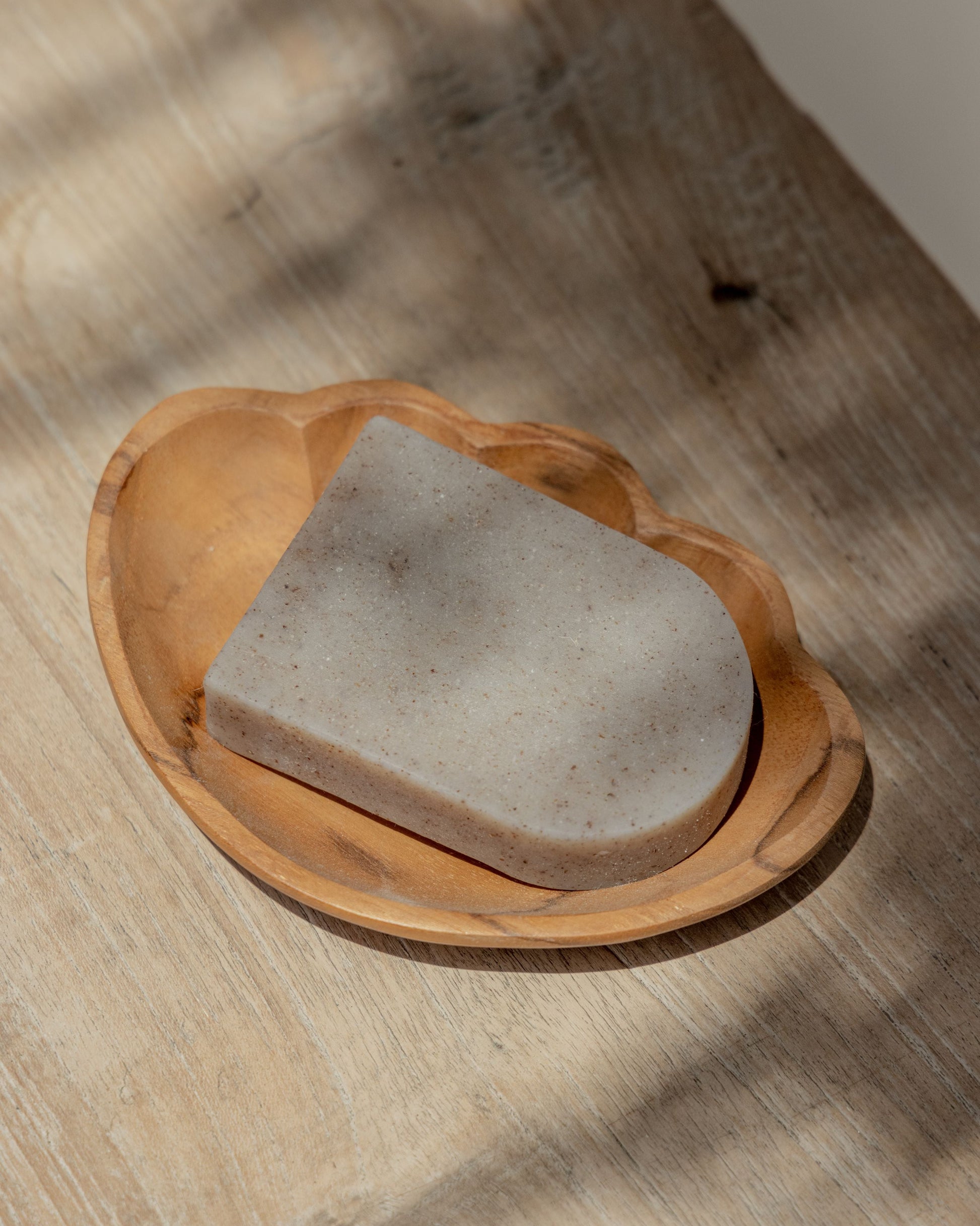 Teak Shell Catch All handmade by Village Thrive using natural materials.