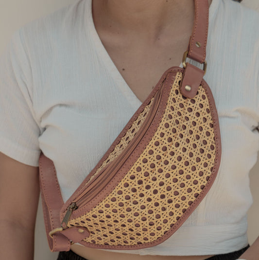 Raja Leather and Cane Sling Bag handmade by Village Thrive using natural materials.